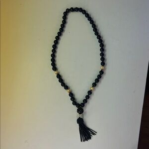 Black Beaded Tassel Necklace with Gold Accents
